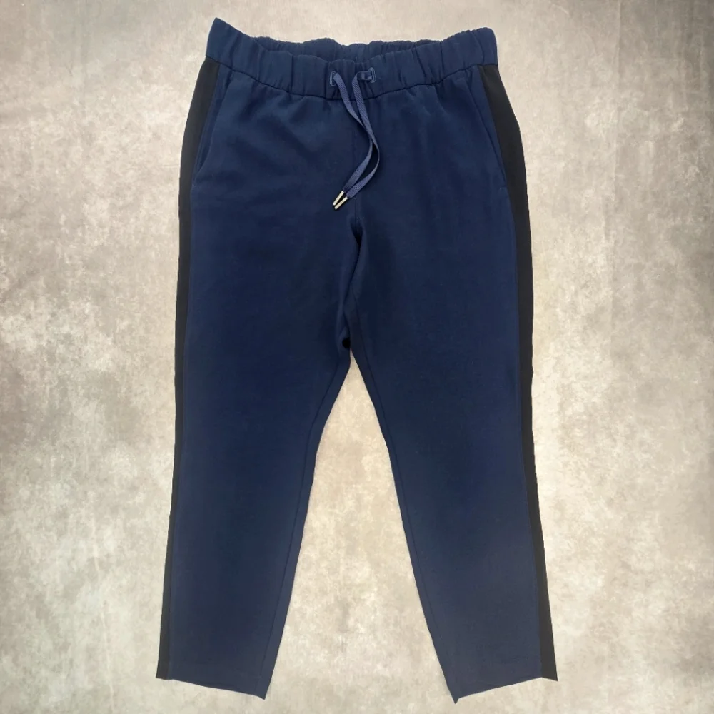 Lululemon Athletica On the Fly Woven Navy with Black Track Stripe Pants